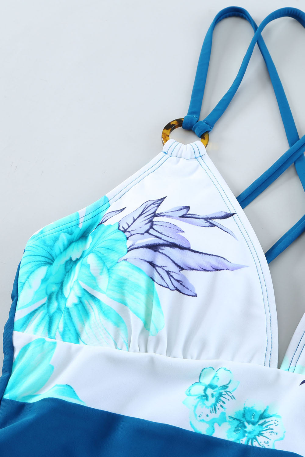 Sky-Blue-Floral-Color-block-Crisscross-Back-One-piece-Swimsuit-closeup-view